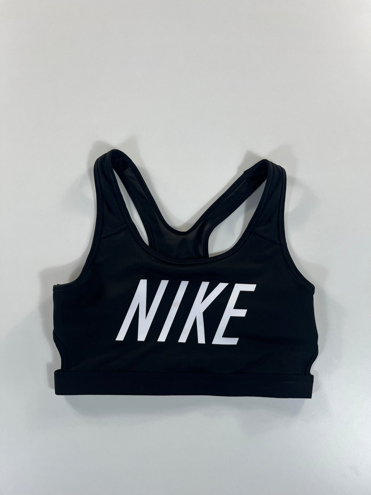 Nike sport melltartó
