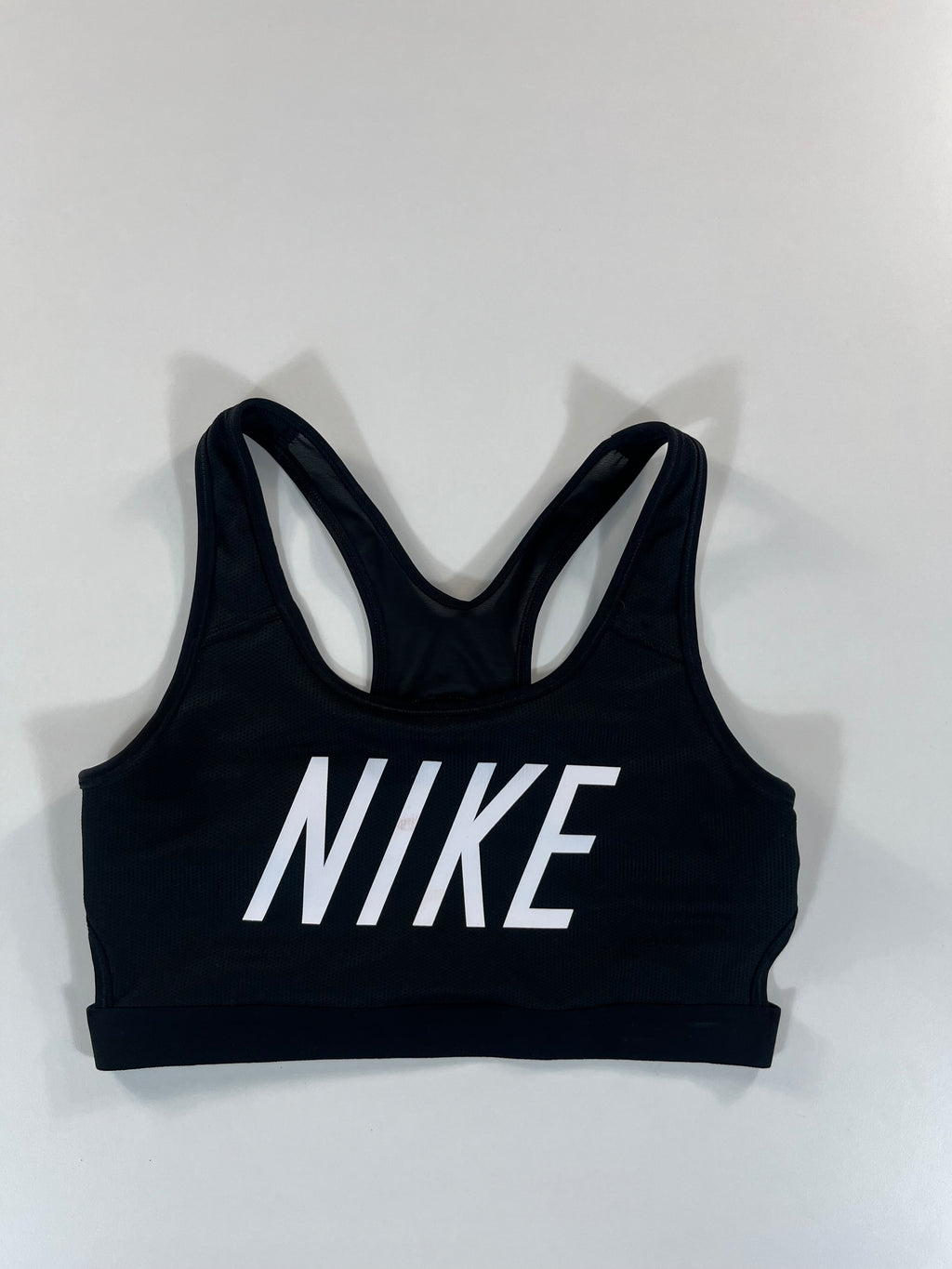 Nike sport melltartó