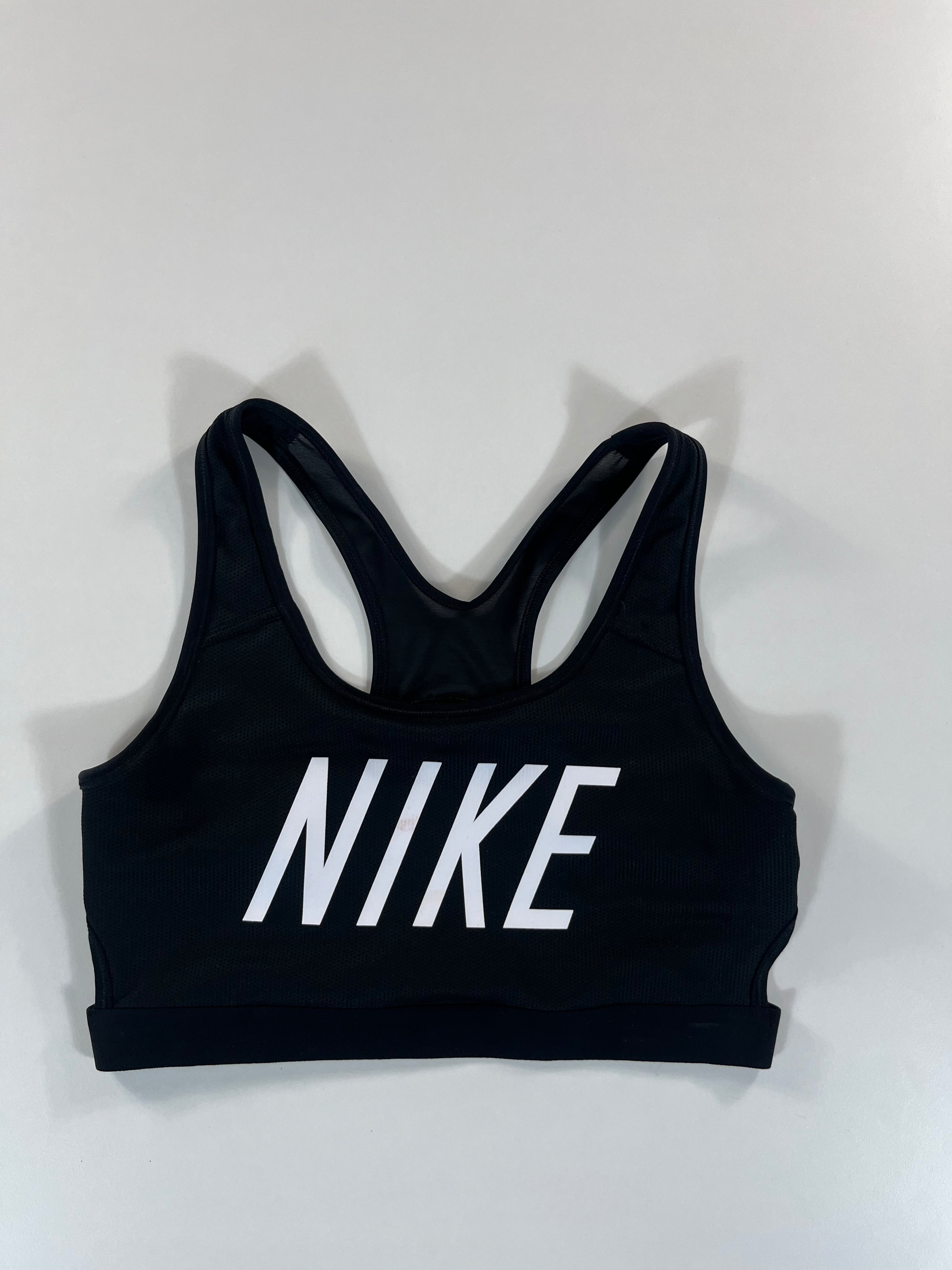 Nike sport melltartó