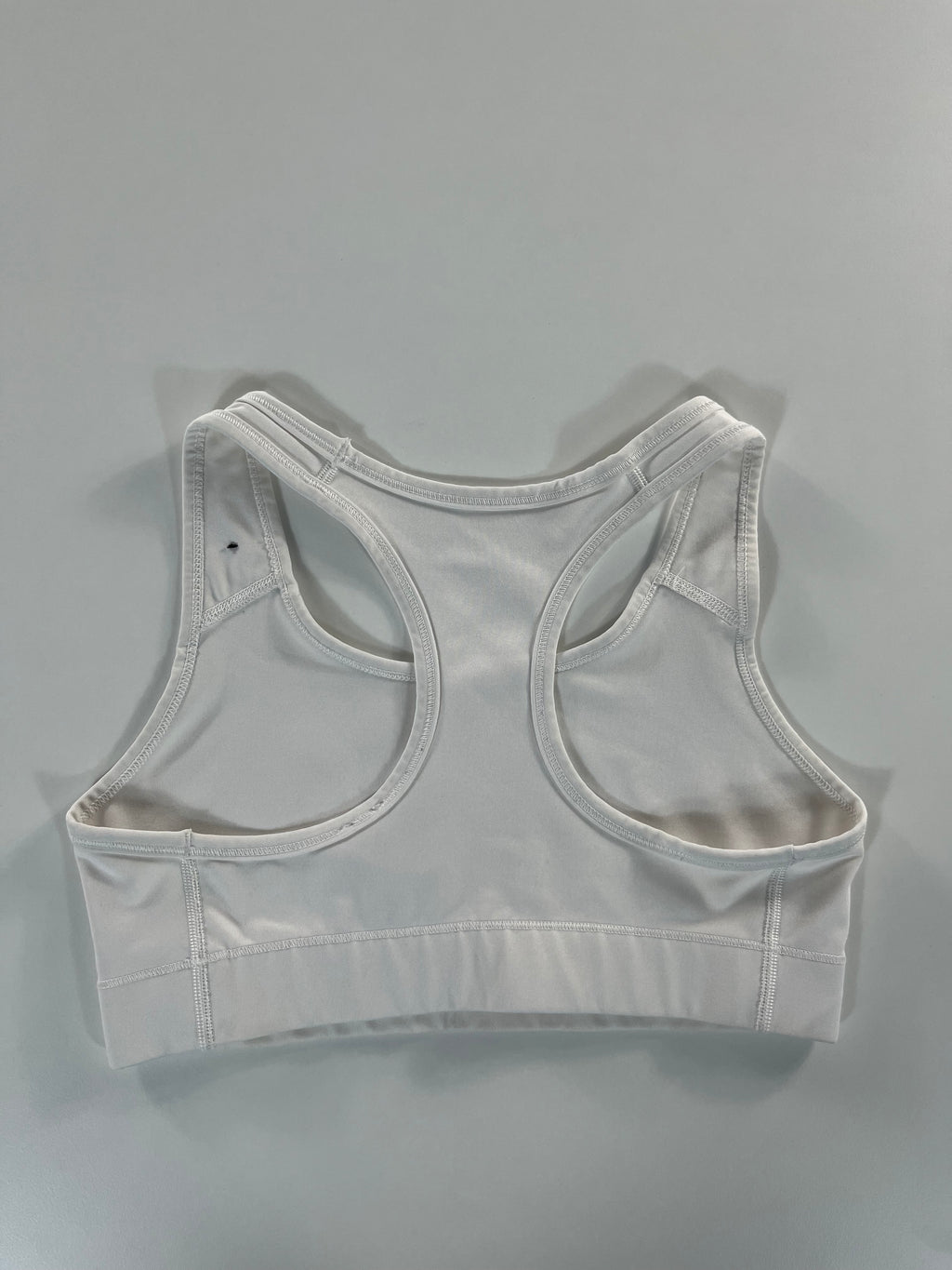 Nike sportmelltartó