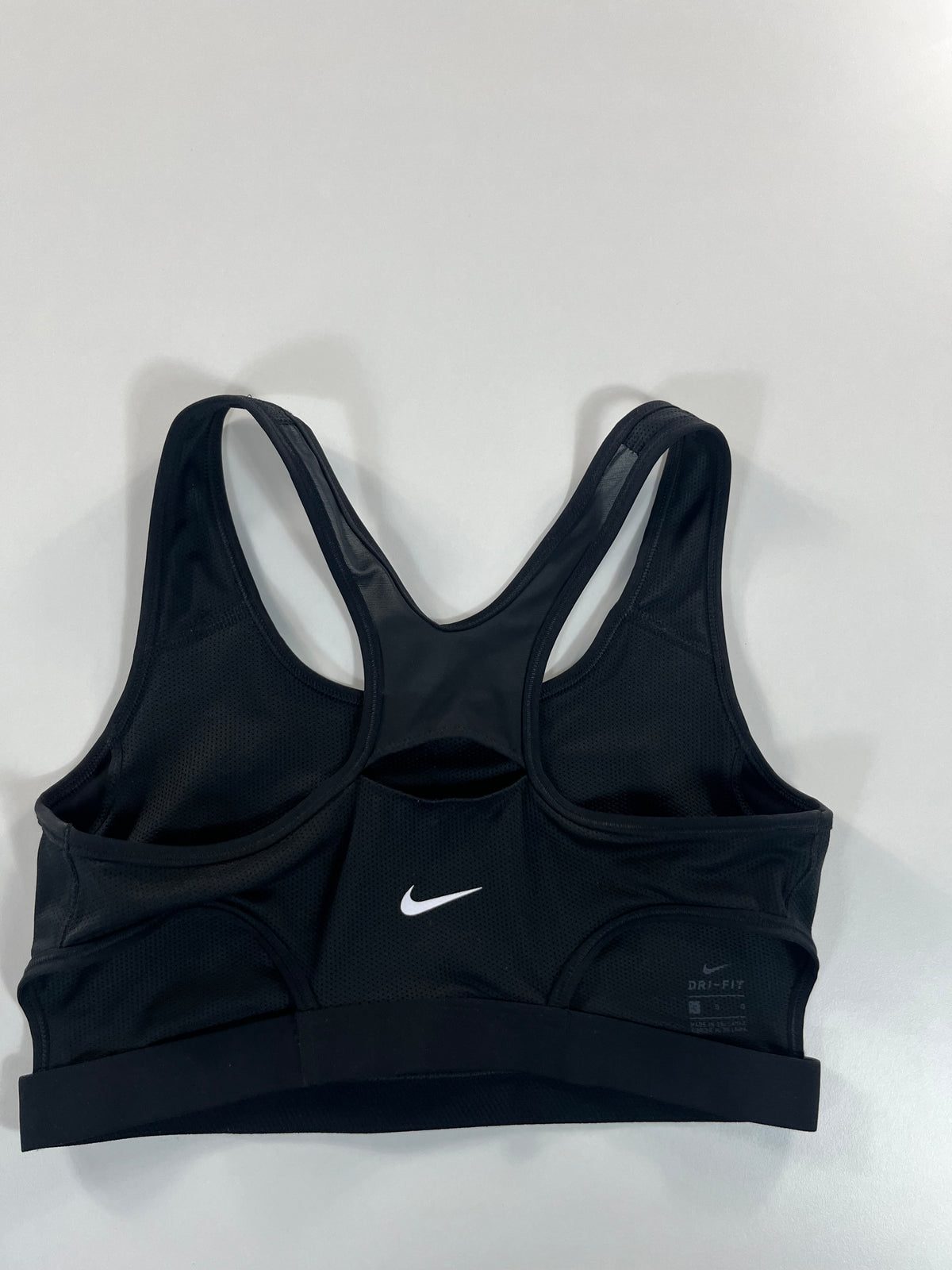 Nike sport melltartó