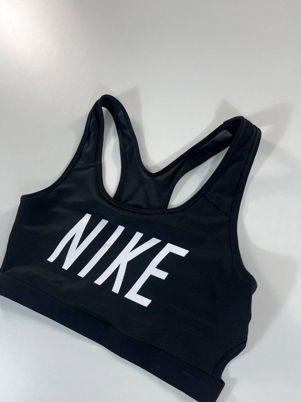 Nike sport melltartó