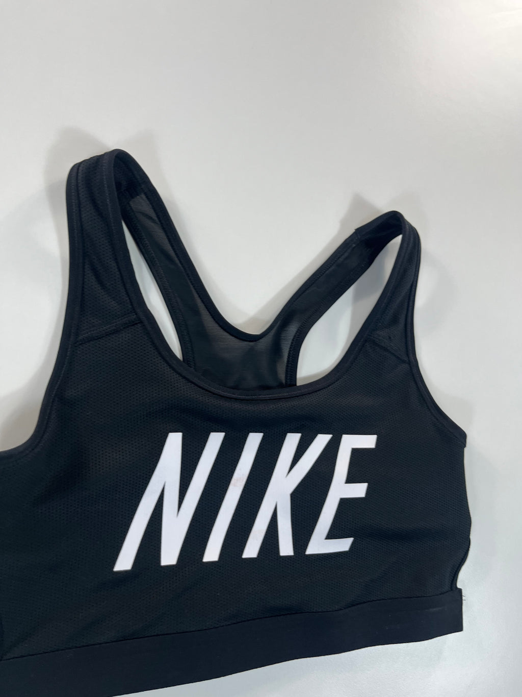 Nike sport melltartó