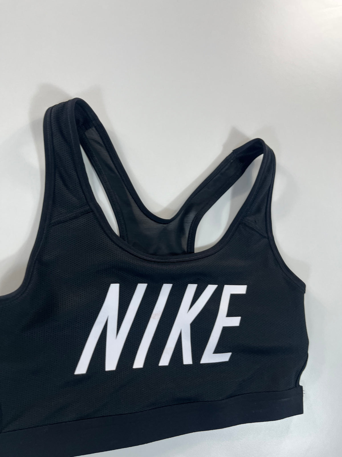 Nike sport melltartó