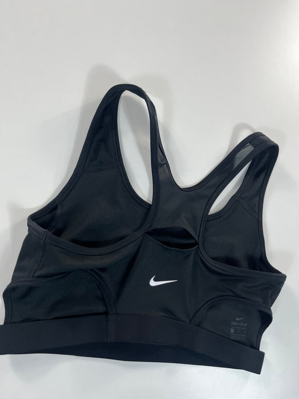 Nike sport melltartó