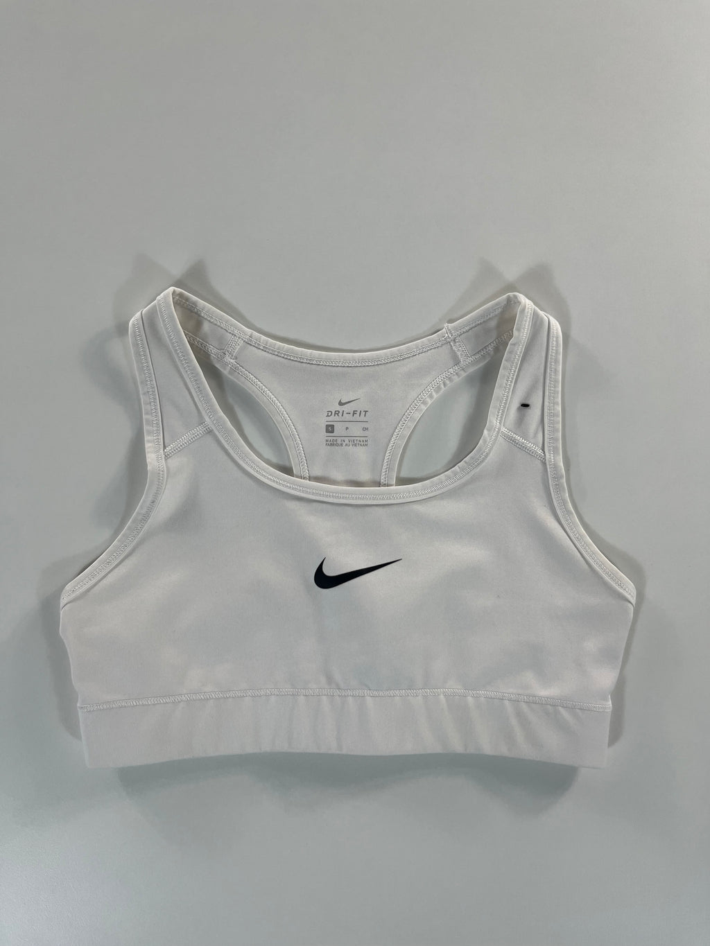 Nike sportmelltartó
