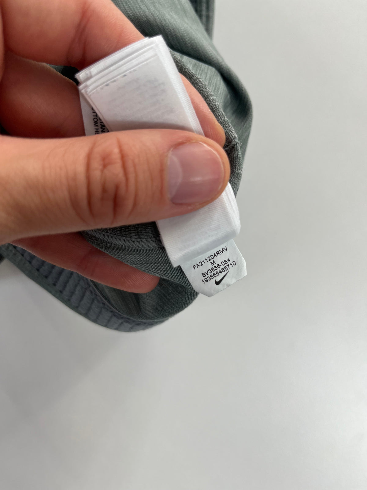 Nike Swoosh sportmelltartó