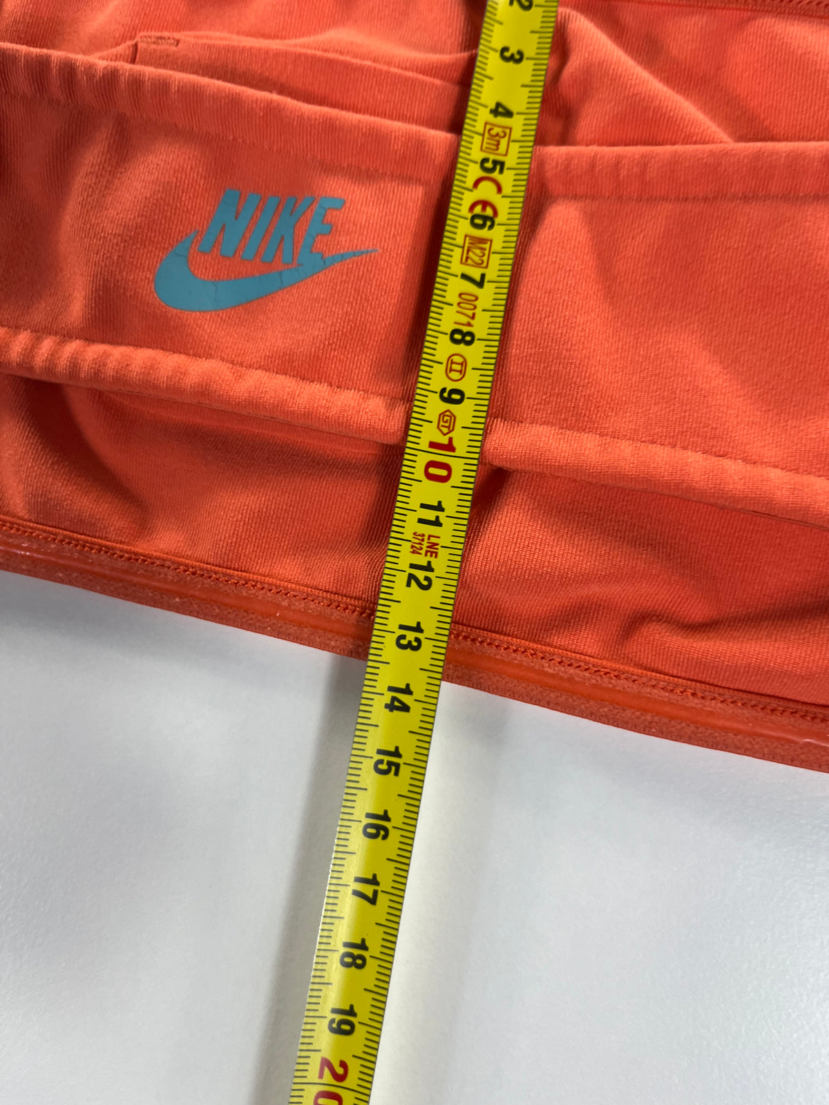 Nike sportmelltartó