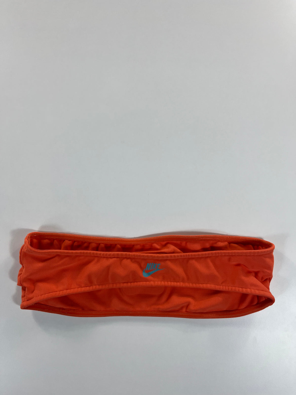 Nike sportmelltartó